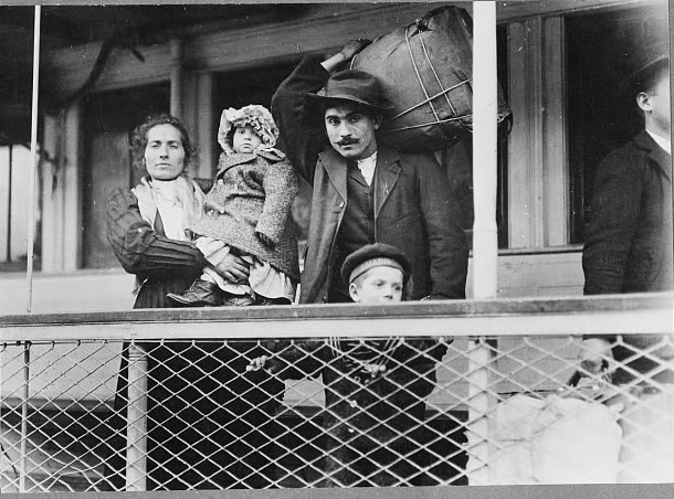 An Italian immigrant family on the ferry leaving Ellis Island
